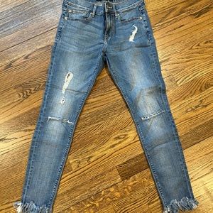 Express Mid Rise ripped jeans